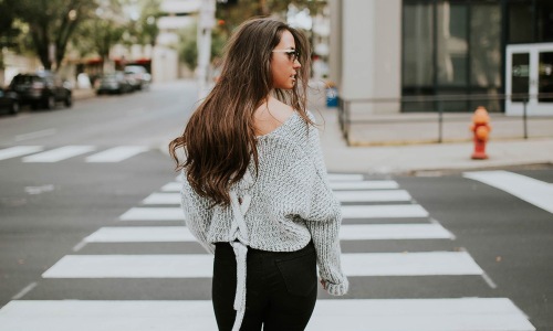 a person walking in a crosswalk